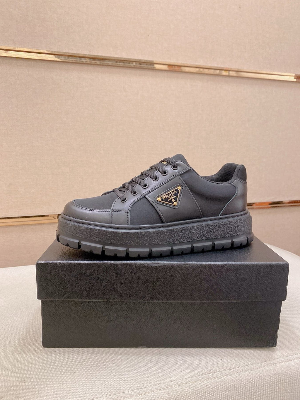 Prada Triangle Plaque Low-Top Sneakers - Treaded Rubber Sole